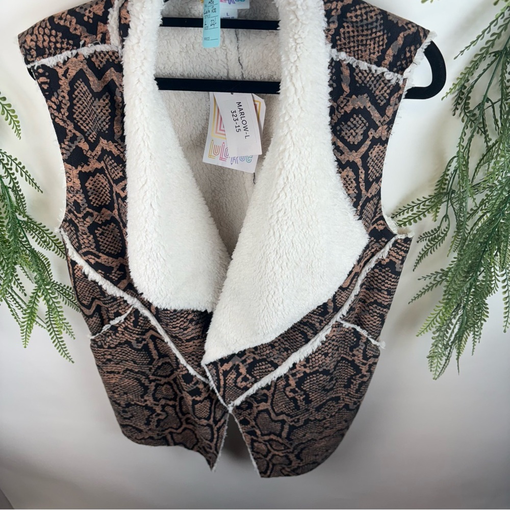 LuLaRoe  animal print Vest. Size Large. NWT